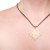 Celtic knot necklace made in natural PU coated brass. Rhombus shaped. On leather strap.